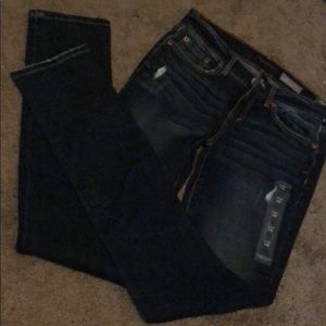 Never worn ripped skinny jeans.